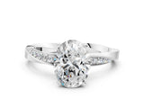 Platinum Oval Cut Diamond Engagement Ring with Side Stone Accents and Four-Prong Setting_13