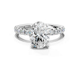 Platinum Oval Cut Diamond Pavé Solitaire Ring with Round Band and Prong Setting_24