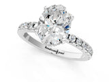 Platinum Oval Cut Diamond Solitaire Ring with Round  Pavé Band and Four-Prong Setting_61