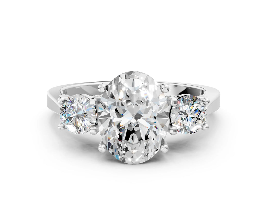 Platinum Oval Cut Diamond Three-Stone Engagement Ring with Prong Setting and Pavé Band_31
