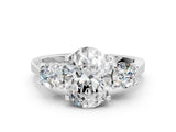 Platinum Oval Cut Diamond Three-Stone Engagement Ring with Prong Setting and Pavé Band_31