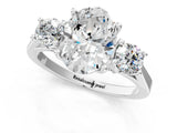 Platinum Oval Cut Diamond Three-Stone Engagement Ring with Prong Setting and Pavé Band_32