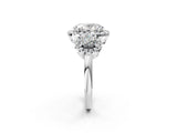 Platinum Oval Cut Diamond Three-Stone Halo Ring with Prong Setting and Pavé Accents_15