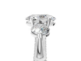 Platinum Oval Cut Diamond Three-Stone Ring with Prong Setting and Pavé Band_60