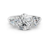 Platinum Oval Cut Diamond Three-Stone Ring with Prong Setting and Pavé Band_7