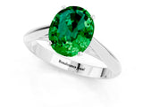 Platinum Oval Cut Emerald Solitaire Engagement Ring with Cathedral Setting and Four-Prong Mount_1