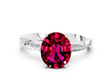 Platinum Oval Cut Garnet Engagement Ring with Side Stone Accents and Four-Prong Setting_24