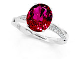Platinum Oval Cut Garnet Engagement Ring with Side Stone Accents and Four-Prong Setting_25