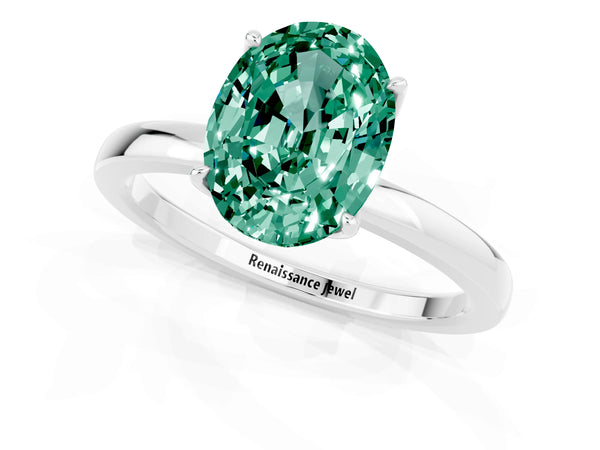 Platinum Oval Cut Green Sapphire Solitaire Ring with Thin Band and Prong Setting