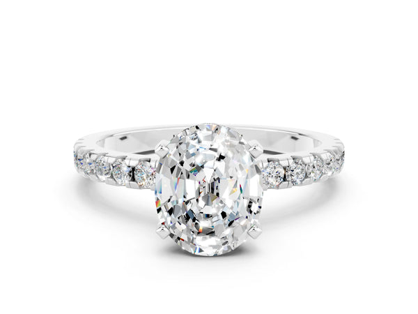 Platinum Oval Cut Moissanite Solitaire Ring with Round Pavé Band and Four-Prong Setting
