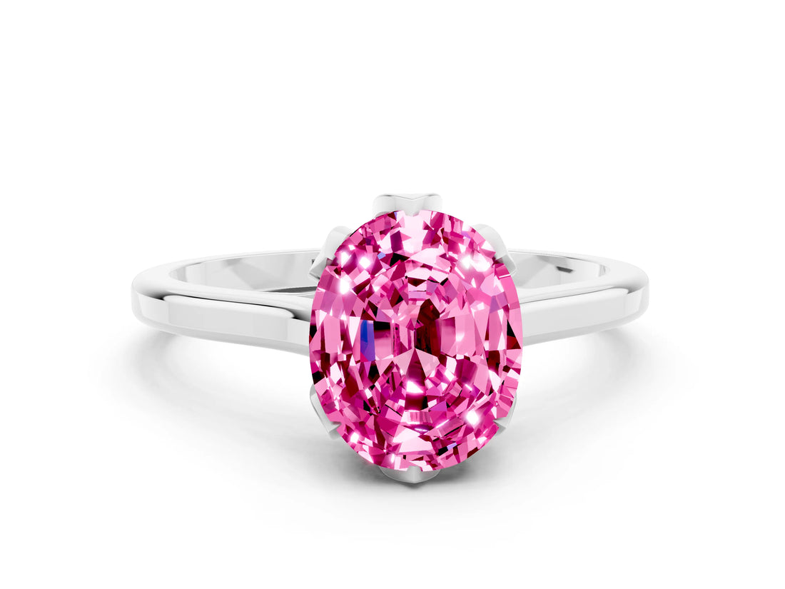 Platinum Oval Cut Pink Sapphire Solitaire Ring with Flower Prong Setting and Classic Band