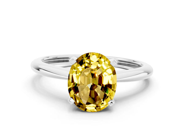 Platinum Oval Cut Yellow Sapphire Solitaire Engagement Ring with Classic Band and Four-Prong Setting