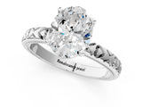 Platinum Oval Solitaire Diamond Engagement Ring with XO Engraved Band and Four-Prong Setting 1