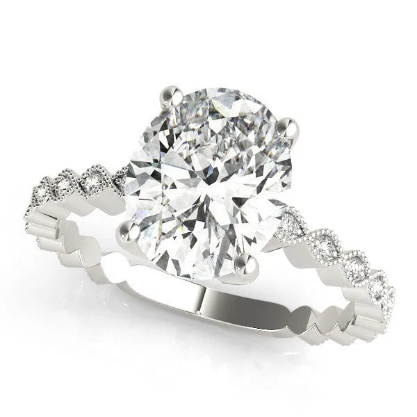 Platinum Oval Solitaire Diamond Ring with Infinity Twist Band and Four-Prong Setting
