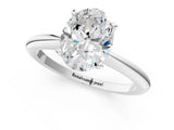 Platinum Oval Solitaire Diamond Ring with Six-Prong Setting on a Classic Band 1