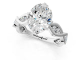 Platinum Oval Solitaire Twist Band with Leaf Prong Setting 2