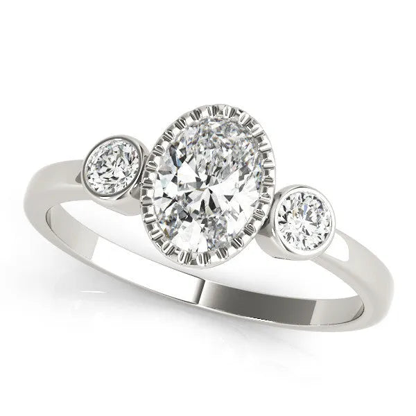 Platinum Oval Three-Stone Bezel Set Diamond Ring with Solitaire Band