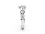 Platinum Pear Brilliant Solitaire with Side Stones on a Pave Band and Four-Prong Setting_24