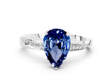 Platinum Pear Cut Blue Sapphire Engagement Ring with Side Stone Accents and Four-Prong Setting_12
