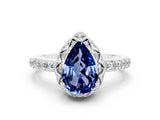 Platinum Pear Cut Blue Sapphire Scalloped Halo Engagement Ring with Round Shared Prong Band_108