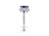Platinum Pear Cut Blue Sapphire Scalloped Halo Engagement Ring with Round Shared Prong Band_110