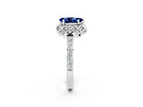 Platinum Pear Cut Blue Sapphire Scalloped Halo Engagement Ring with Round Shared Prong Band_86