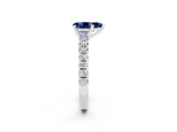 Platinum Pear Cut Blue Sapphire Solitaire Pavé Engagement Ring with Round Band and Prong Setting_98