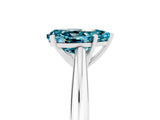 Platinum Pear Cut Blue Topaz Solitaire Engagement Ring with Cathedral Setting and Four-Prong Mount_11