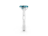 Platinum Pear Cut Blue Topaz Solitaire Engagement Ring with Cathedral Setting and Four-Prong Mount_2