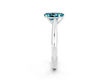 Platinum Pear Cut Blue Topaz Solitaire Engagement Ring with Cathedral Setting and Four-Prong Mount_8