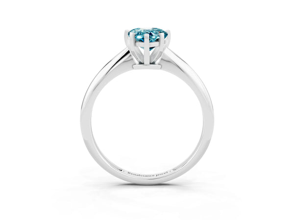 Platinum Pear Cut Blue Topaz Solitaire Engagement Ring with Classic Band and Four-Prong Setting