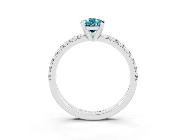 Platinum Pear Cut Blue Topaz Solitaire Pavé Engagement Ring with Round Band and Prong Setting