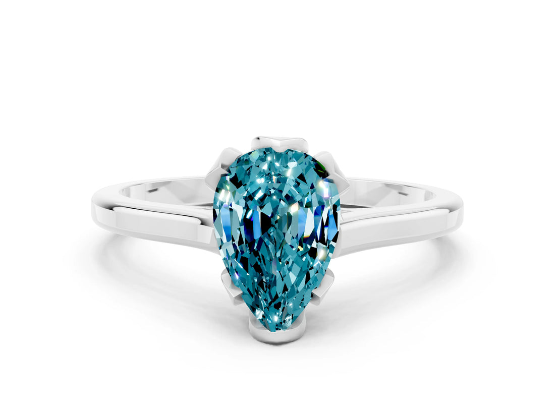 Platinum Pear Cut Blue Topaz Solitaire Ring with Flower Prong Setting and Classic Band_12