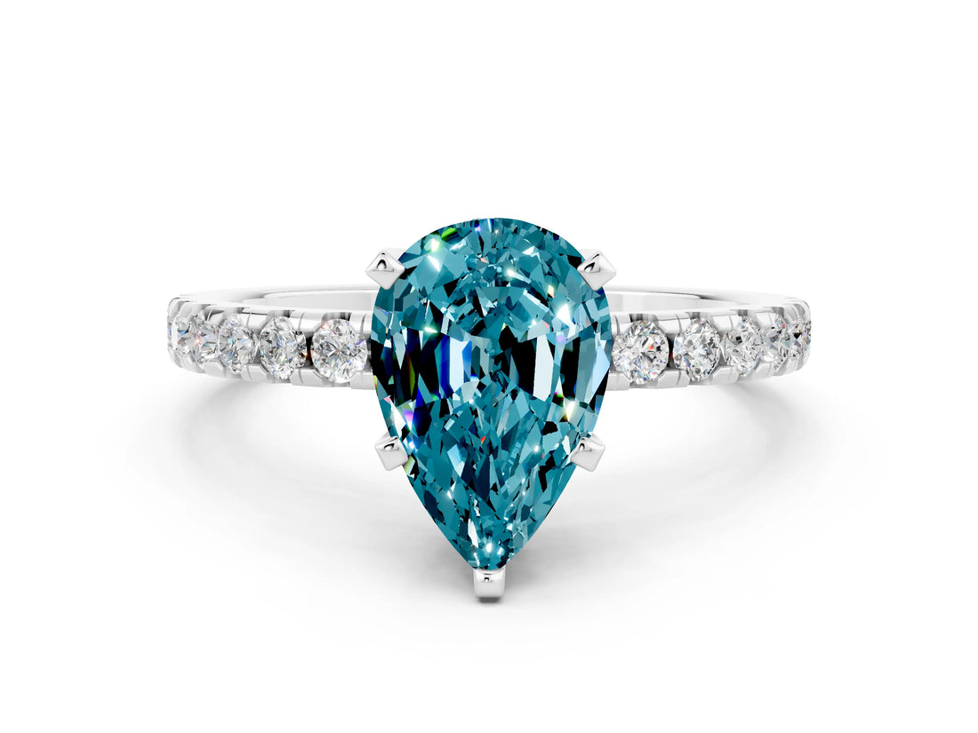 Platinum Pear Cut Blue Topaz Solitaire Ring with Round  Pavé Band and Four-Prong Setting_36