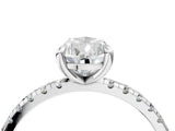 Platinum Pear Cut Diamond Brilliant Solitaire Ring with Pavé Band and Four-Prong Setting_16