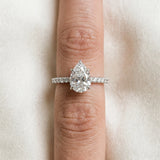 Platinum Pear Cut Diamond Solitaire Engagement Ring with Pavé Band and Four-Prong Setting_68