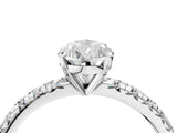 Platinum Pear Cut Diamond Solitaire Pavé Engagement Ring with Round Band and Prong Setting_6