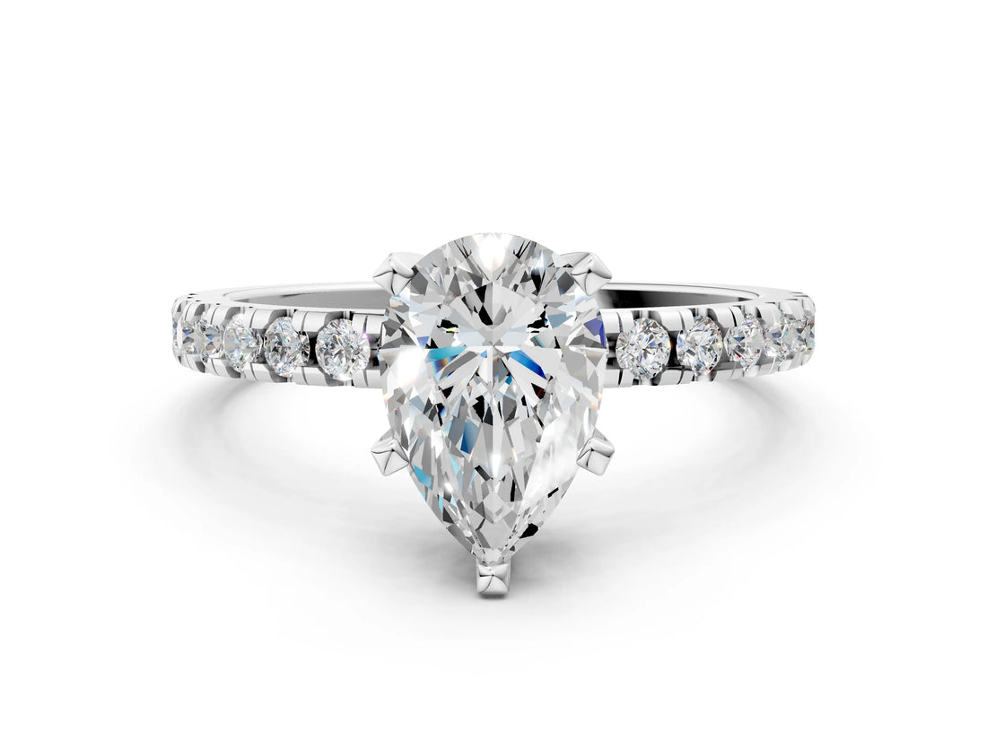 Platinum Pear Cut Diamond Solitaire Ring with Round  Pavé Band and Four-Prong Setting_58