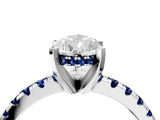 Platinum Pear Cut Diamond Solitaire Ring with Round with Blue Sapphire side stone Pavé Band and Four-Prong Setting_16