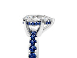Platinum Pear Cut Diamond Solitaire Ring with Round with Blue Sapphire side stone Pavé Band and Four-Prong Setting_17