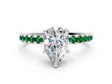 Platinum Pear Cut Diamond Solitaire Ring with Round with Emerald side stone Pavé Band and Four-Prong Setting_12