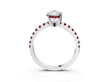 Platinum Pear Cut Diamond Solitaire Ring with Round with Ruby side stone Pavé Band and Four-Prong Setting_21