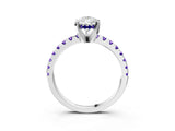 Platinum Pear Cut Diamond Solitaire Ring with Round with Tanzanite side stone Pavé Band and Four-Prong Setting_15