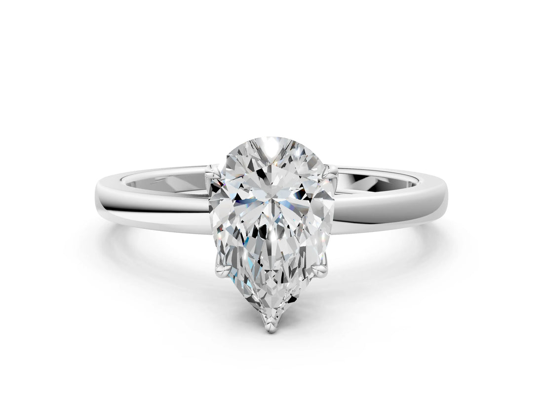 Platinum Pear Cut Diamond Solitaire Ring with Thin Band and Prong Setting_12
