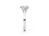 Platinum Pear Cut Diamond Three-Stone Engagement Ring with Prong Setting and Pavé Band_33