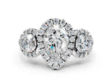 Platinum Pear Cut Diamond Three-Stone Halo Ring with Prong Setting and Pavé Accents_13