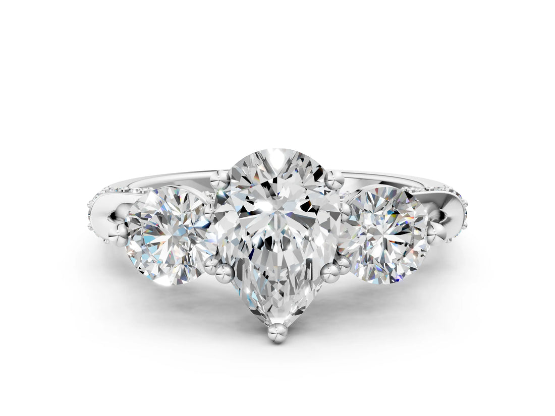 Platinum Pear Cut Diamond Three-Stone Ring with Prong Setting and Pavé Band_55
