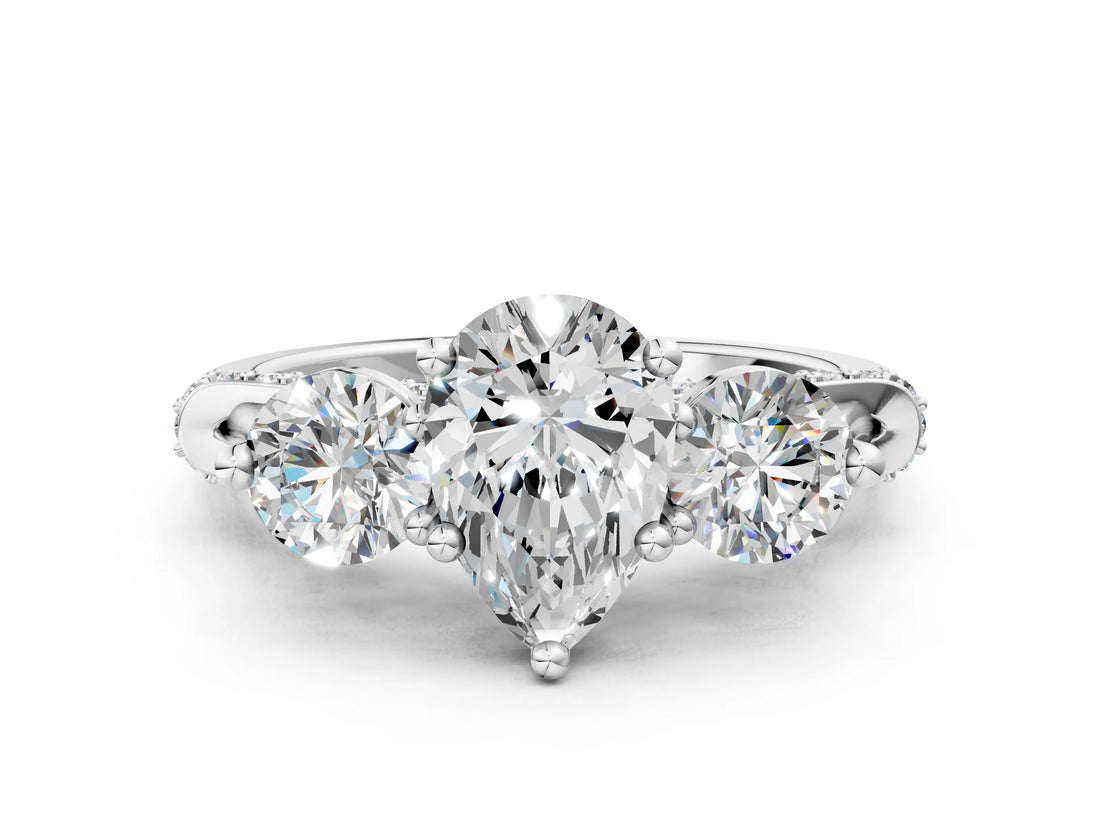 Platinum Pear Cut Diamond Three-Stone Ring with Prong Setting and Pavé Band_7