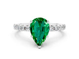 Platinum Pear Cut Emerald Solitaire Ring with Round  Pavé Band and Four-Prong Setting_36