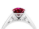 Platinum Pear Cut Garnet Solitaire Engagement Ring with Cathedral Setting and Four-Prong Mount_10